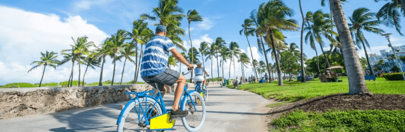 Cyclists riding along the Gulf Coast path near Treasure Island