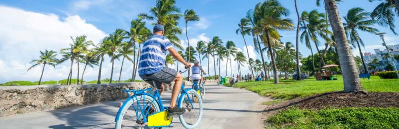 Cyclists riding along the Gulf Coast path near Treasure Island