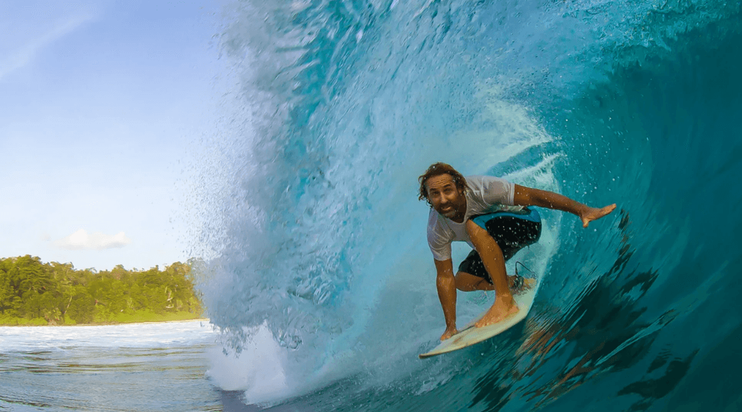 Surfer riding a wave on the Gulf Coast