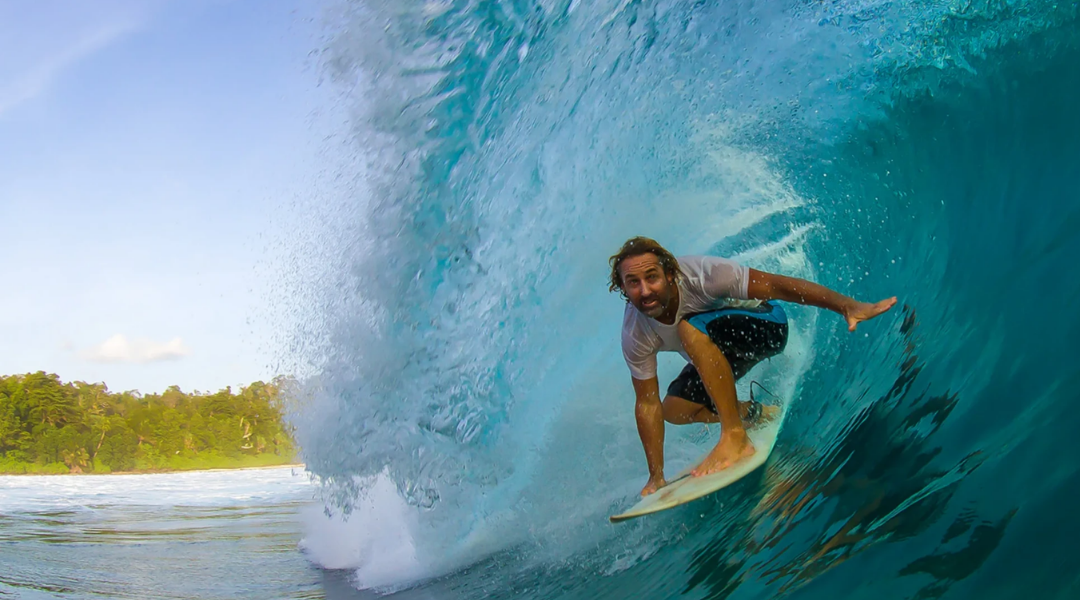 Surfer riding a wave on the Gulf Coast